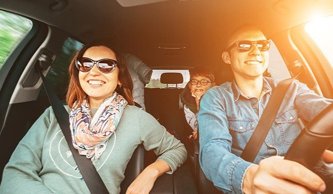 Family inside their car while driving